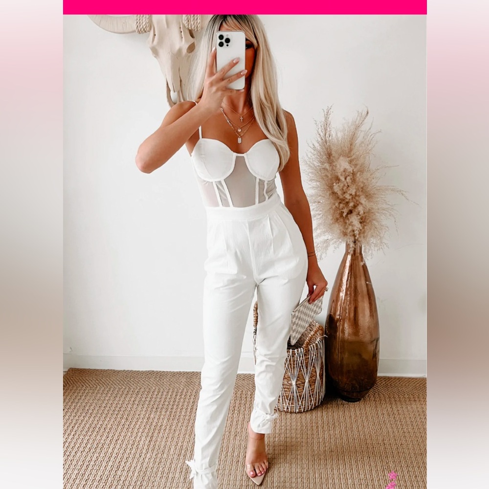 Gorgeous white, mesh bodice jumpsuit. NWT. Small. Non smoking home.